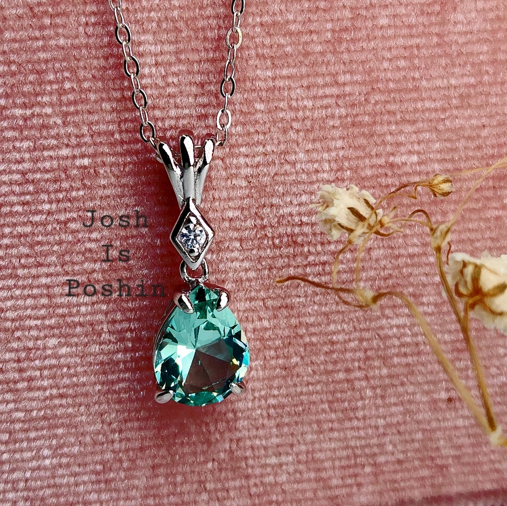Sea green emerald diamond pendant necklace in sterling silver